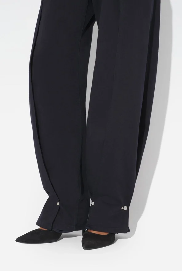 The Snap-Button Denim Jeans The Snap-Button Denim Jeans